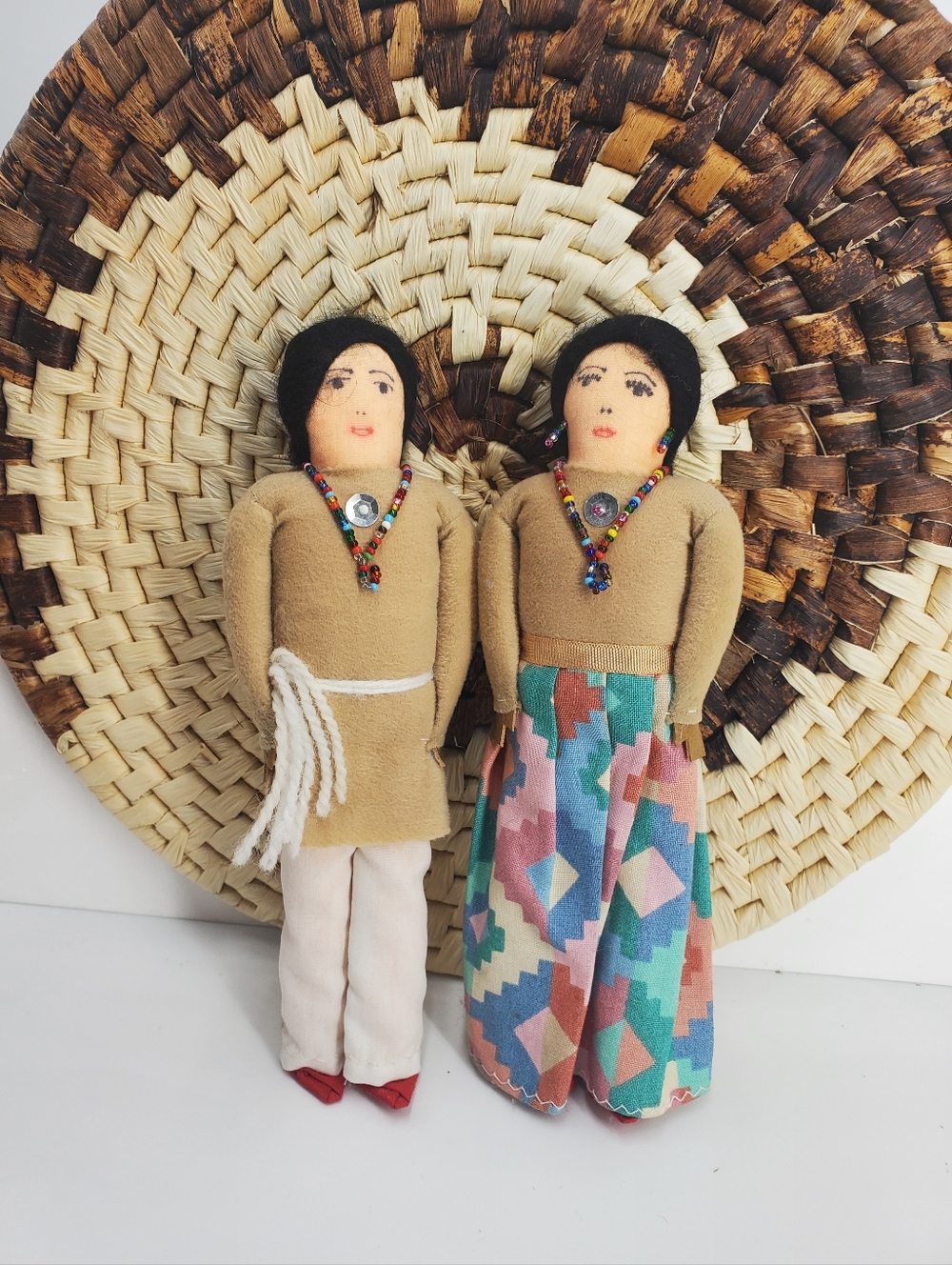Vintage pair of hand crafted primitive Navajo tourist cloth dolls; man and woman